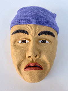 Man with Hats by Lynda Hess
