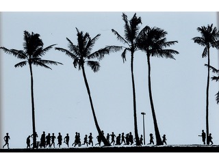 Joggers at Magic Island by Philippe Gross