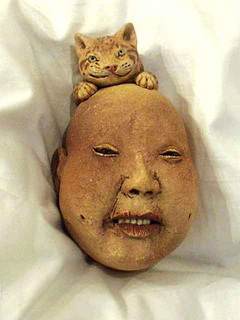 Face w/ Cat by Esther Shimazu