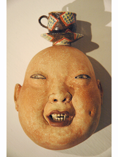 Head Balancing Teacup by Esther Shimazu