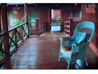 Blue Chair on Porch by Joan  Cooke