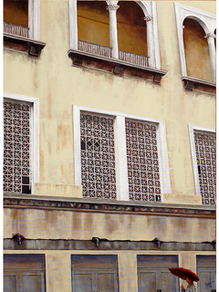 The Side of the Hawaii Theater with a Red Umbrella by Sandra Blazel