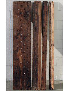 Wood panels recovered from lawnboat in distress by Dorothy Faison