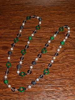 Jade and Black Agate by Rita  Chung