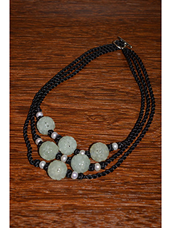 Three Strand Shou Jade by Rita  Chung