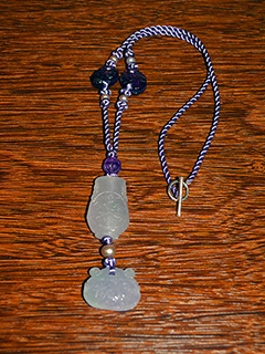'83 Jade (natural) pendant on cord by Rita  Chung