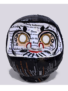 Daruma goes to the Rock n Roll Hall of Fame by Sandra Blazel