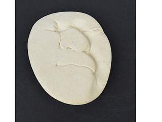 Smash Face Trivet #1 by Karen Lucas